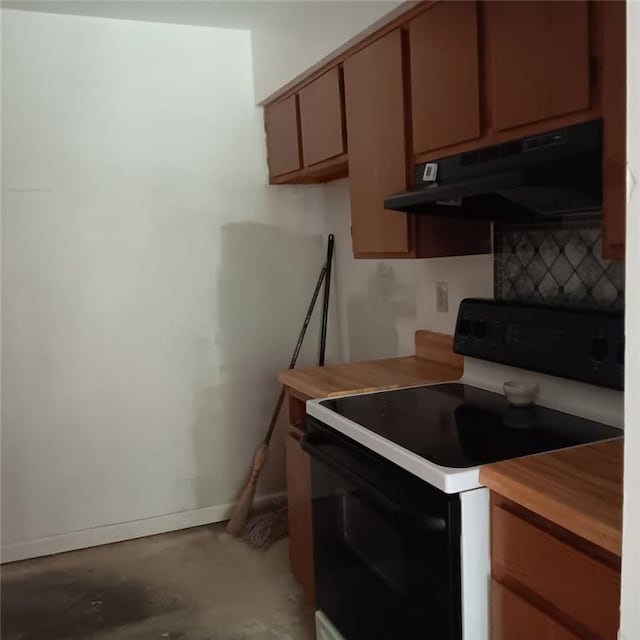 kitchen with concrete flooring and range with electric cooktop