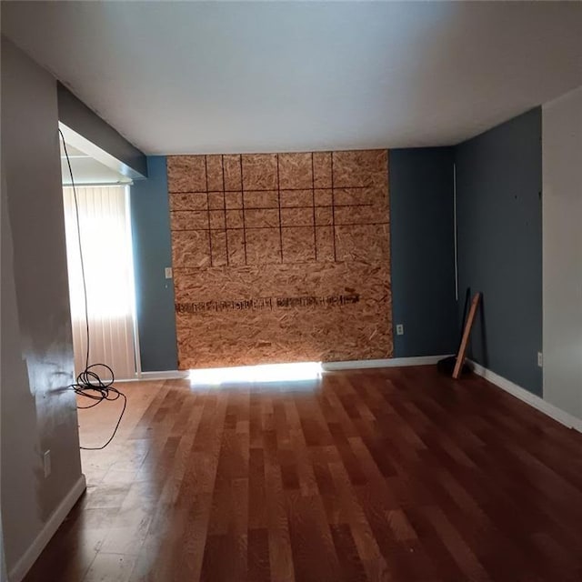 empty room featuring dark hardwood / wood-style floors