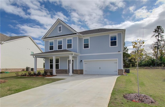 craftsman-style home featuring brick siding, central air condition unit, driveway, and a front yard