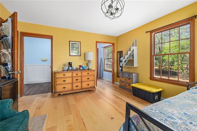 294 Hillcrest Hts, Cornelia, GA 30531 - bedroom featuring hardwood / wood-style floors, baseboards, and a chandelier