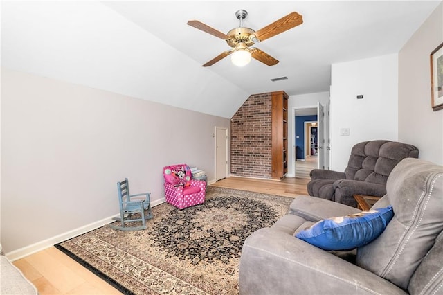 294 Hillcrest Hts, Cornelia, GA 30531 - living room with wood finished floors, a ceiling fan, vaulted ceiling, and baseboards