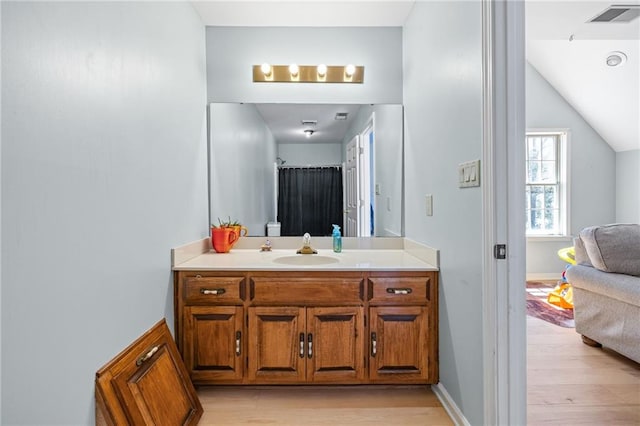 294 Hillcrest Hts, Cornelia, GA 30531 - full bathroom featuring wood finished floors, vanity, and lofted ceiling