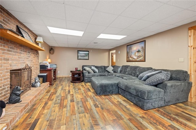 294 Hillcrest Hts, Cornelia, GA 30531 - living area with hardwood / wood-style floors, a fireplace, and a paneled ceiling