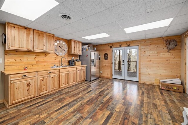294 Hillcrest Hts, Cornelia, GA 30531 - kitchen featuring stainless steel fridge with ice dispenser, a sink, wooden walls, dark wood-style flooring, and french doors