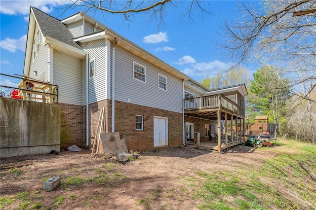 294 Hillcrest Hts, Cornelia, GA 30531 - rear view of property featuring brick siding and a wooden deck