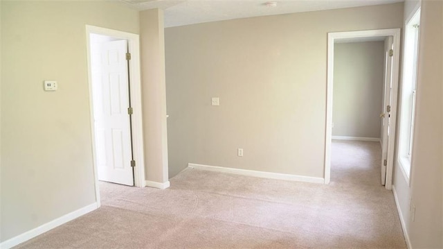 623 Shadowmoore Dr, Riverdale, GA 30274 - carpeted empty room with baseboards
