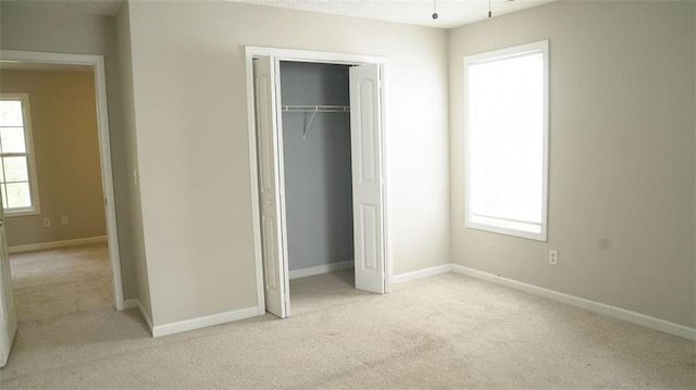 623 Shadowmoore Dr, Riverdale, GA 30274 - unfurnished bedroom featuring carpet floors and a closet