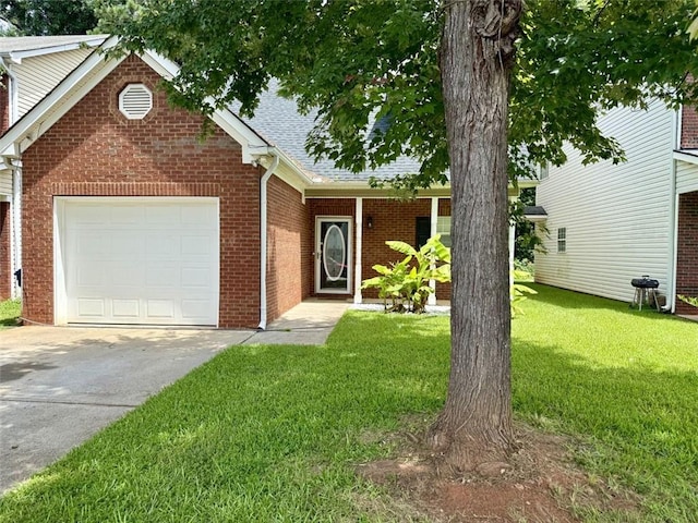 623 Shadowmoore Dr, Riverdale, GA 30274 - view of front facade featuring brick siding, a garage, a front yard, driveway, and a shingled roof