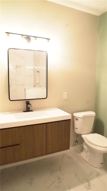 623 Shadowmoore Dr, Riverdale, GA 30274 - bathroom featuring marble look tiles and vanity