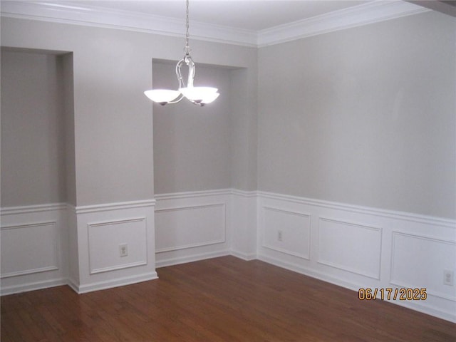 2975 Wintercrest Trce, Dunwoody, GA 30360 - unfurnished dining area featuring a chandelier, wainscoting, wood finished floors, and crown molding
