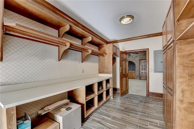 mudroom featuring ornamental molding