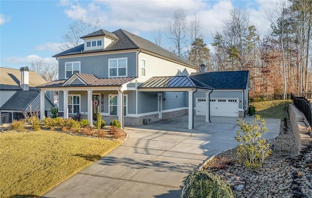 view of front of home with a garage and a porch