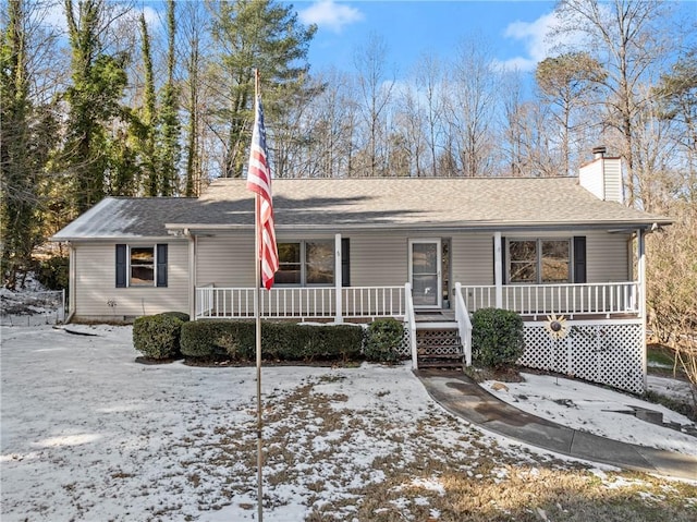 ranch-style home with covered porch