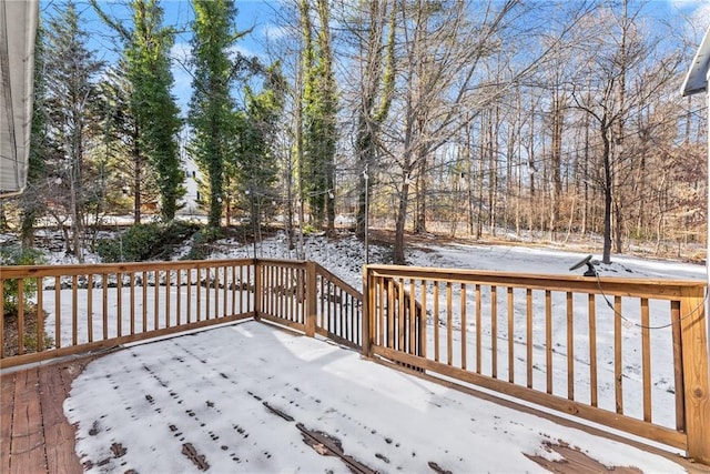 view of snow covered deck