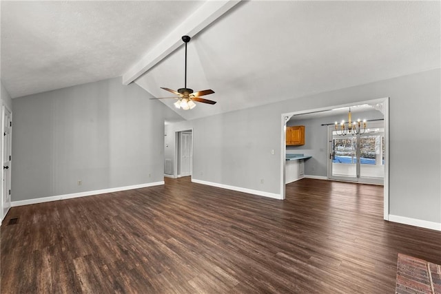 unfurnished living room featuring ceiling fan with notable chandelier, vaulted ceiling with beams, and dark hardwood / wood-style floors