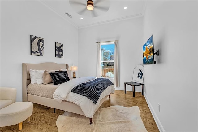 1774 Vesta Ave, Atlanta, GA 30337 - bedroom featuring wood finished floors, ornamental molding, baseboards, ceiling fan, and recessed lighting