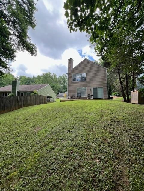 5030 N Bridges Dr, Alpharetta, GA 30022 - back of house with a chimney