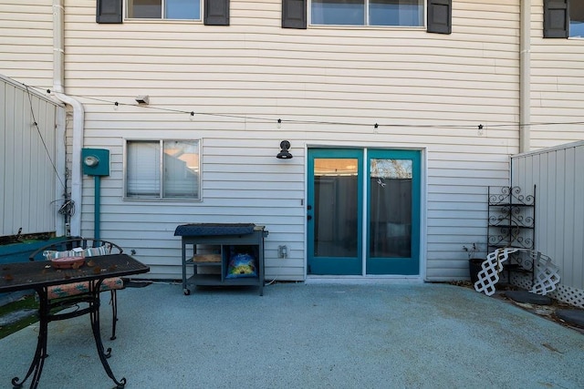 rear view of property featuring a patio area