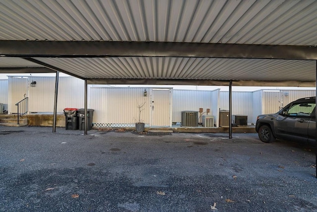 view of parking with a carport