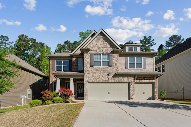 6977 Demeter Dr, Atlanta, GA 30349 - craftsman-style house with driveway, stone siding, an attached garage, and a front lawn