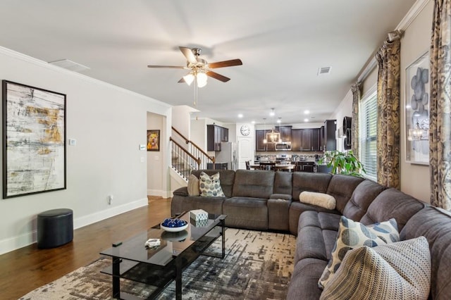 6977 Demeter Dr, Atlanta, GA 30349 - living area with stairway, a ceiling fan, wood finished floors, baseboards, and recessed lighting