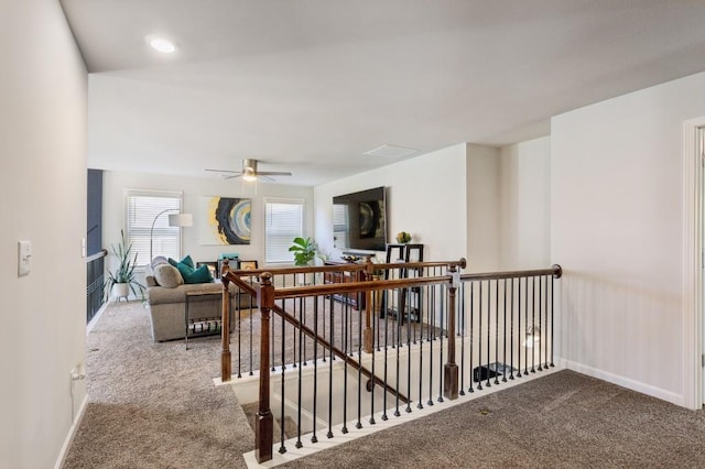 6977 Demeter Dr, Atlanta, GA 30349 - corridor featuring carpet floors, an upstairs landing, and baseboards