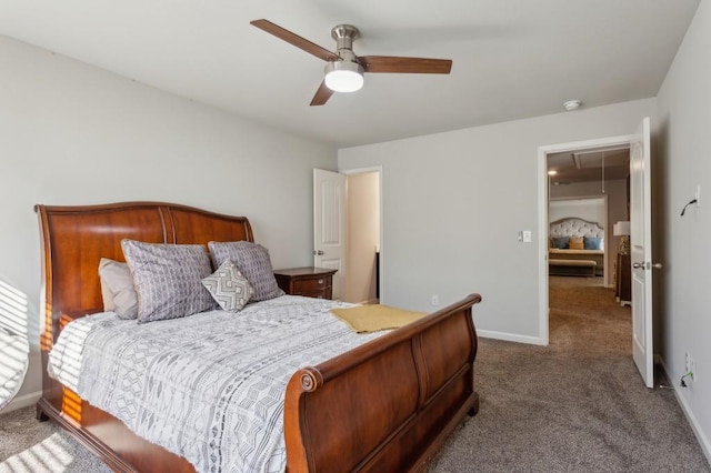 6977 Demeter Dr, Atlanta, GA 30349 - bedroom with attic access, carpet flooring, and ceiling fan