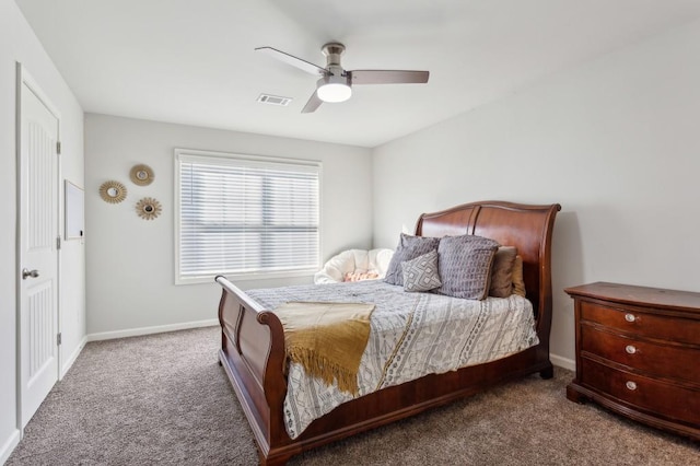 6977 Demeter Dr, Atlanta, GA 30349 - bedroom with carpet flooring, baseboards, and ceiling fan
