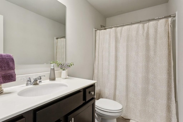 6977 Demeter Dr, Atlanta, GA 30349 - bathroom with toilet and vanity