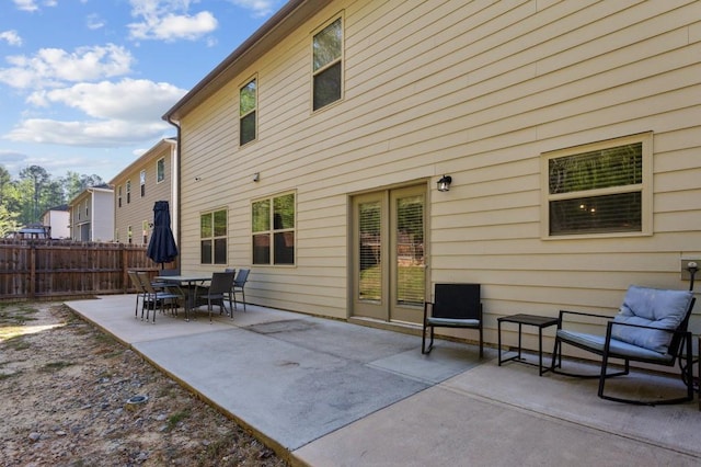 6977 Demeter Dr, Atlanta, GA 30349 - back of property with fence and a patio area