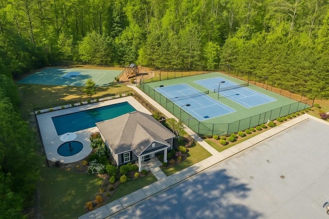 6977 Demeter Dr, Atlanta, GA 30349 - aerial view of a forest and a pool area