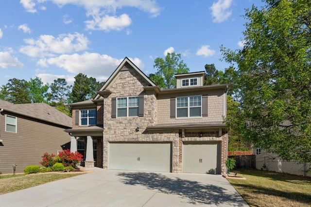 6977 Demeter Dr, Atlanta, GA 30349 - craftsman inspired home with a garage, concrete driveway, and stone siding
