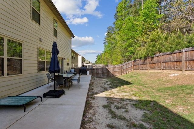6977 Demeter Dr, Atlanta, GA 30349 - view of yard featuring a patio area