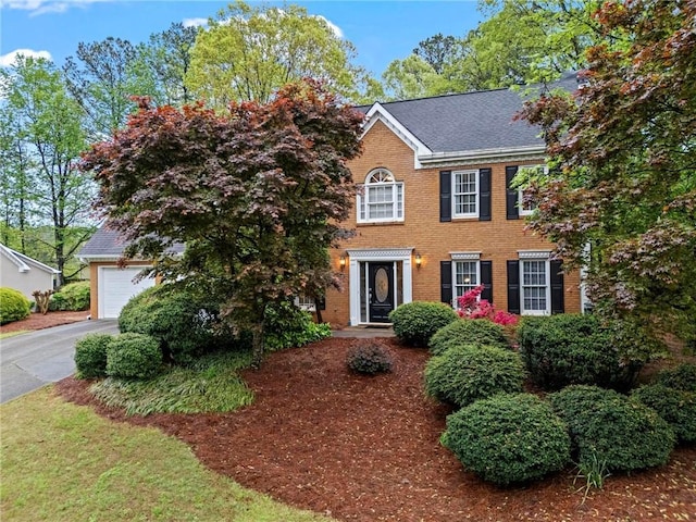 5663 Brookstone Dr NW, Acworth, GA 30101 - view of front of house with brick siding and concrete driveway