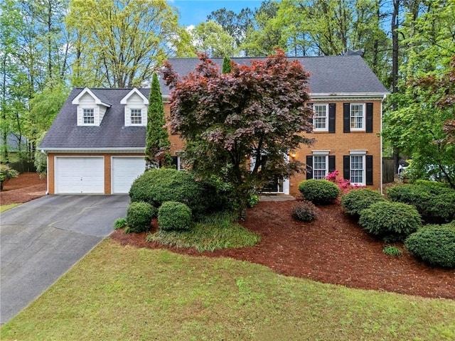 5663 Brookstone Dr NW, Acworth, GA 30101 - view of front of house with brick siding and aphalt driveway