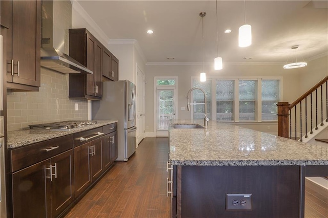 1949 Townsend Ct NE Unit 22, Atlanta, GA 30329 - kitchen with wall chimney range hood, stainless steel appliances, a sink, dark wood-style floors, and ornamental molding