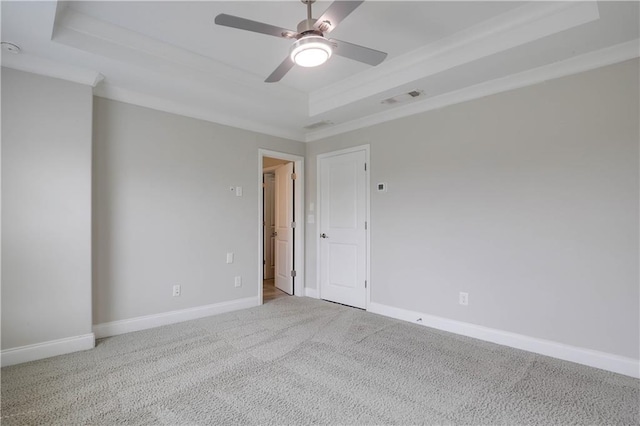 1949 Townsend Ct NE Unit 22, Atlanta, GA 30329 - carpeted spare room featuring a raised ceiling, a ceiling fan, crown molding, and baseboards