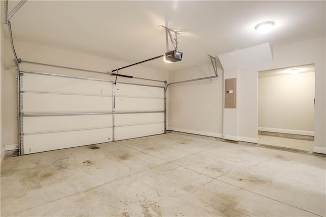 1949 Townsend Ct NE Unit 22, Atlanta, GA 30329 - garage featuring electric panel, a garage door opener, and baseboards