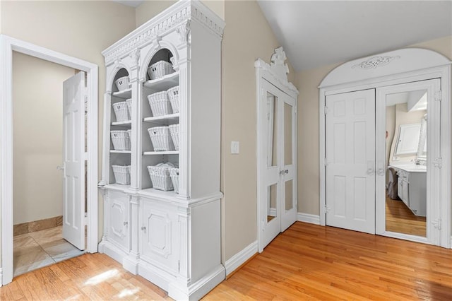 3231 Connemara Trce, Lawrenceville, GA 30044 - corridor featuring light wood-style flooring and baseboards