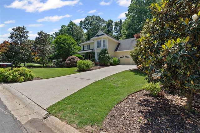 3231 Connemara Trce, Lawrenceville, GA 30044 - view of front of property with concrete driveway, a front lawn, and a garage