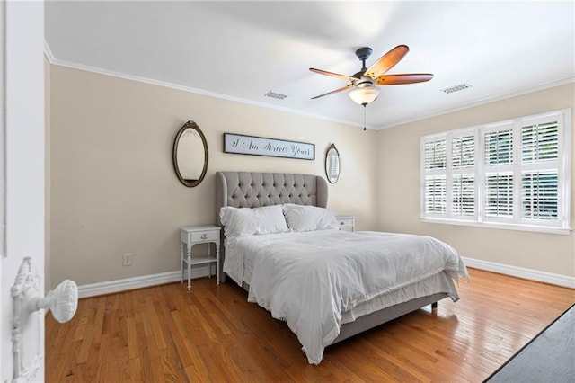 3231 Connemara Trce, Lawrenceville, GA 30044 - bedroom featuring baseboards, wood finished floors, ornamental molding, and ceiling fan