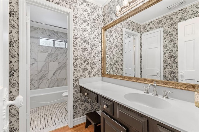 3231 Connemara Trce, Lawrenceville, GA 30044 - full bathroom featuring toilet, vanity, bathing tub / shower combination, baseboards, and crown molding