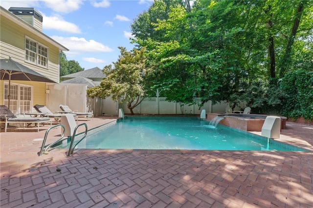 3231 Connemara Trce, Lawrenceville, GA 30044 - view of pool with a hot tub, a fenced backyard, and a patio area