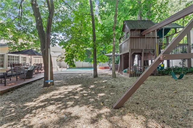 3231 Connemara Trce, Lawrenceville, GA 30044 - view of yard featuring a playground and a patio
