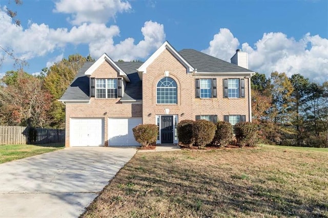 116 Rolling Meadows Ct, Hampton, GA 30228 - view of front of property featuring a front lawn and a garage