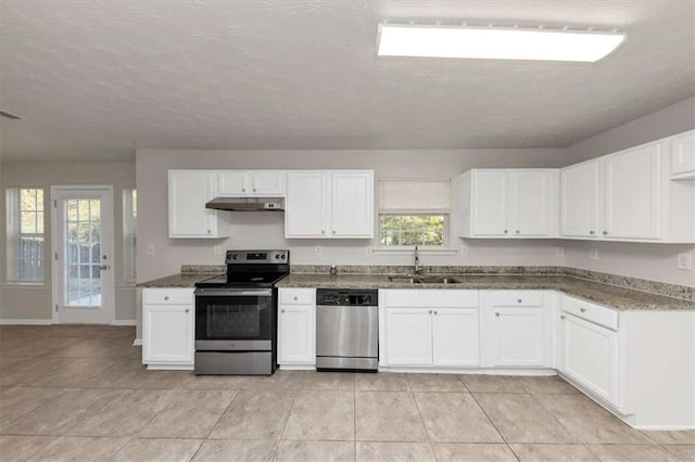 116 Rolling Meadows Ct, Hampton, GA 30228 - kitchen with white cabinets, stainless steel appliances, a wealth of natural light, and sink