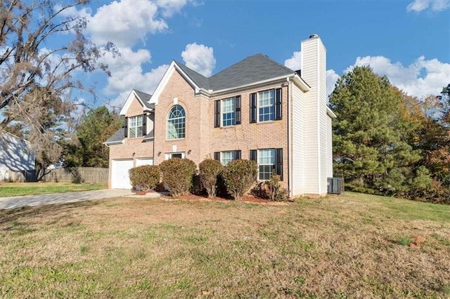 116 Rolling Meadows Ct, Hampton, GA 30228 - view of front of home with a front lawn, a garage, and cooling unit
