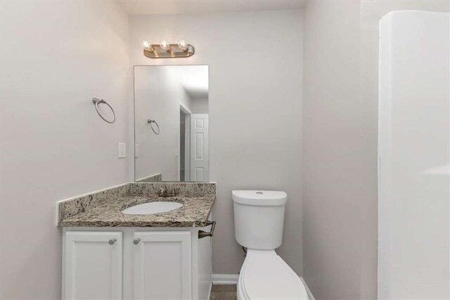 116 Rolling Meadows Ct, Hampton, GA 30228 - bathroom with vanity and toilet