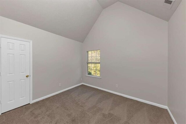 116 Rolling Meadows Ct, Hampton, GA 30228 - unfurnished room featuring carpet and vaulted ceiling