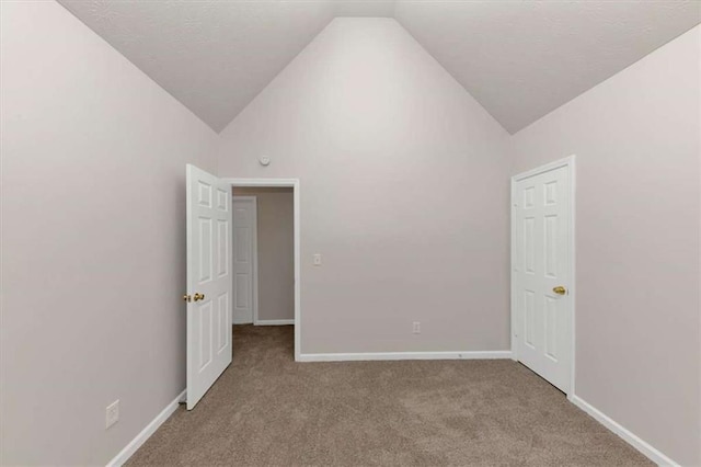 116 Rolling Meadows Ct, Hampton, GA 30228 - carpeted spare room featuring vaulted ceiling